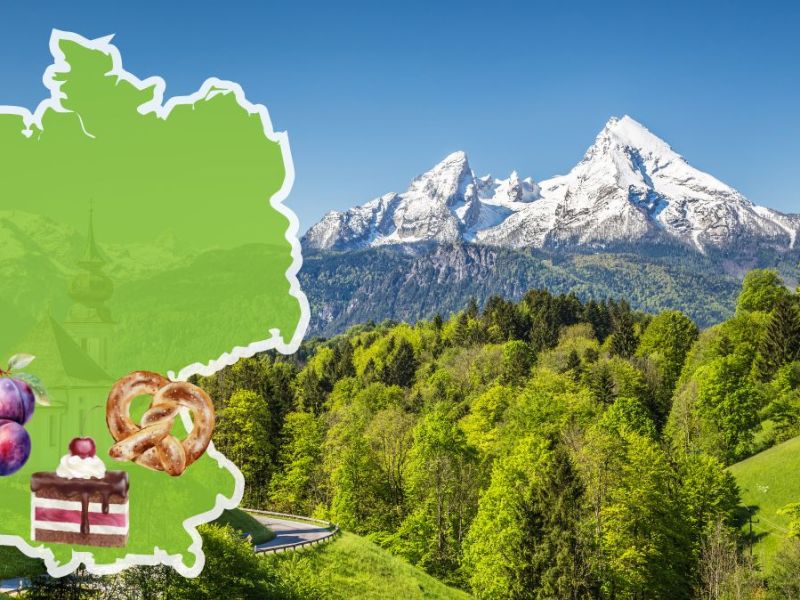 Süddeutsche Küche: Bayrische Alpen, davor eine grüne Deutschlandkarte mit Bilden von Schwarzwälder Kirschtorte, Pflaumen und einer Brezel